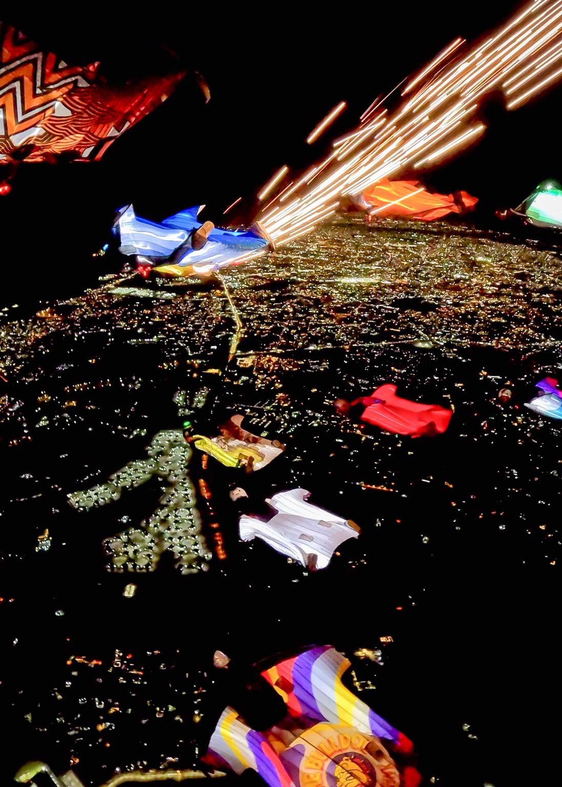 20-way-wingsuit-formation-over-Benghazi-at-night-jumps view from the formation
